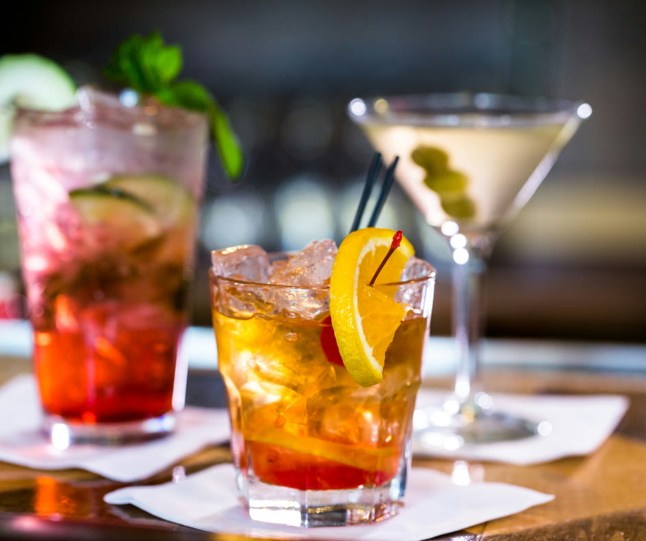 A trio of freshly crafted Swizzle cocktails